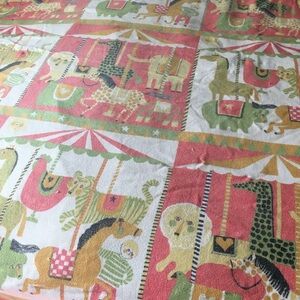 Vintage carousel/merry-go-round child’s blanket/throw.